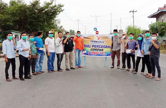 Panwaslu Kecamatan Rambah Hilir bagikan 1000 Masker
