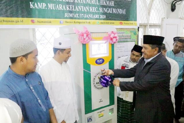 Bupati Alfedri Launching ATM Beras Sungai Mandau