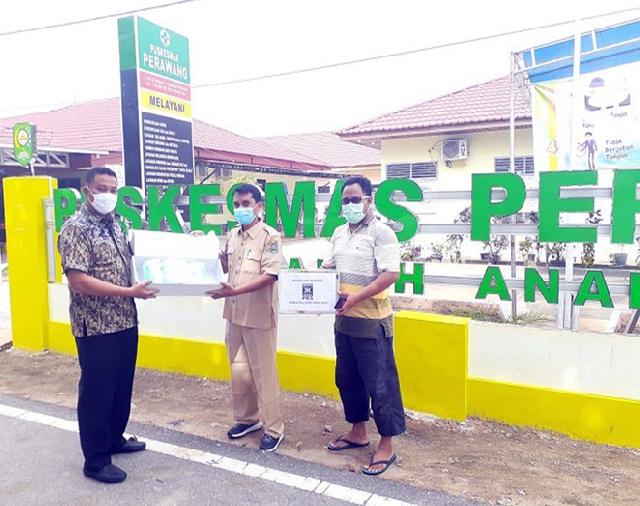 Anggota DPRD Riau Markarius Anwar Donasikan 1500 Masker