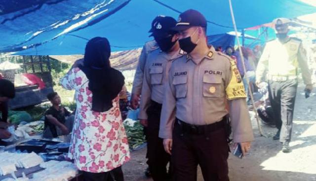 Kasubag Humas Polres Rohil Himbau Warga Dan Penjual Wajib Pakai Masker